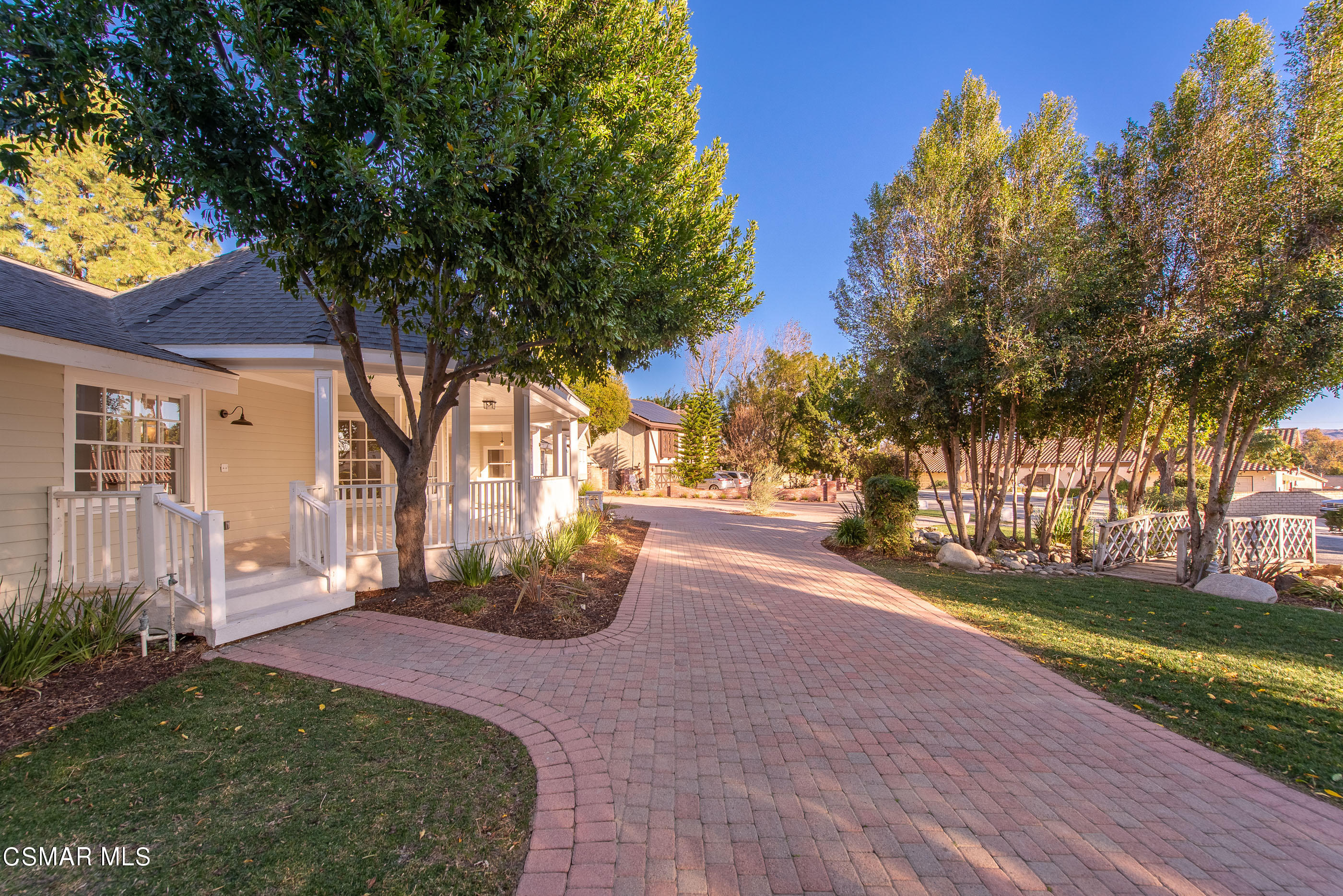 2959 Happy Lane Simi Valley, CA 93065 - Photo 8 of 92 a view of a house with backyard and a tree