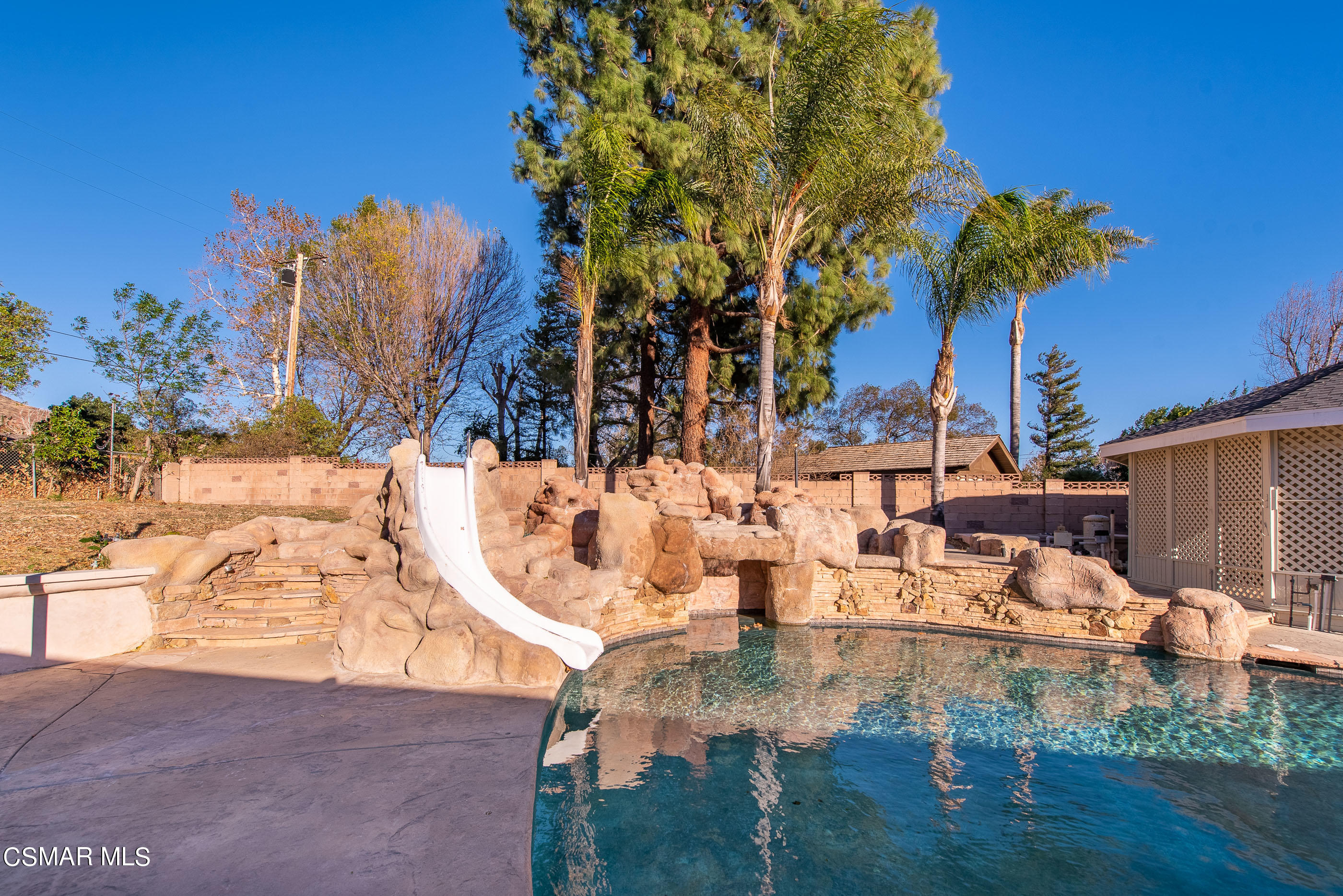 2959 Happy Lane Simi Valley, CA 93065 - Photo 73 of 92 a view of a swimming pool with a patio