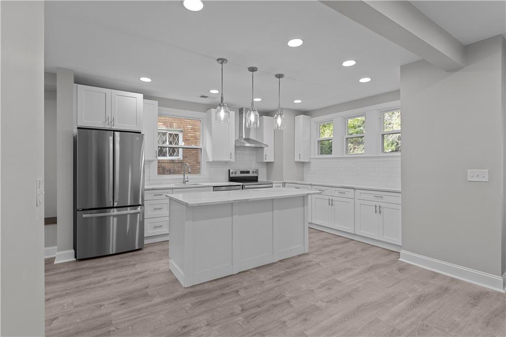 748 Anaheim Street Pittsburgh, PA 15219 - Photo 12 of 29 a kitchen with a refrigerator and a sink
