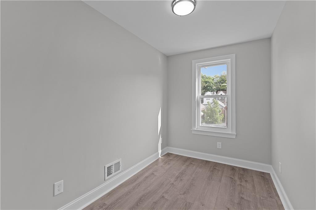 748 Anaheim Street Pittsburgh, PA 15219 - Photo 24 of 29 an empty room with a window