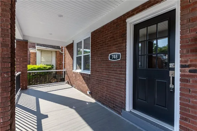 a view of a patio with a outdoor seating
