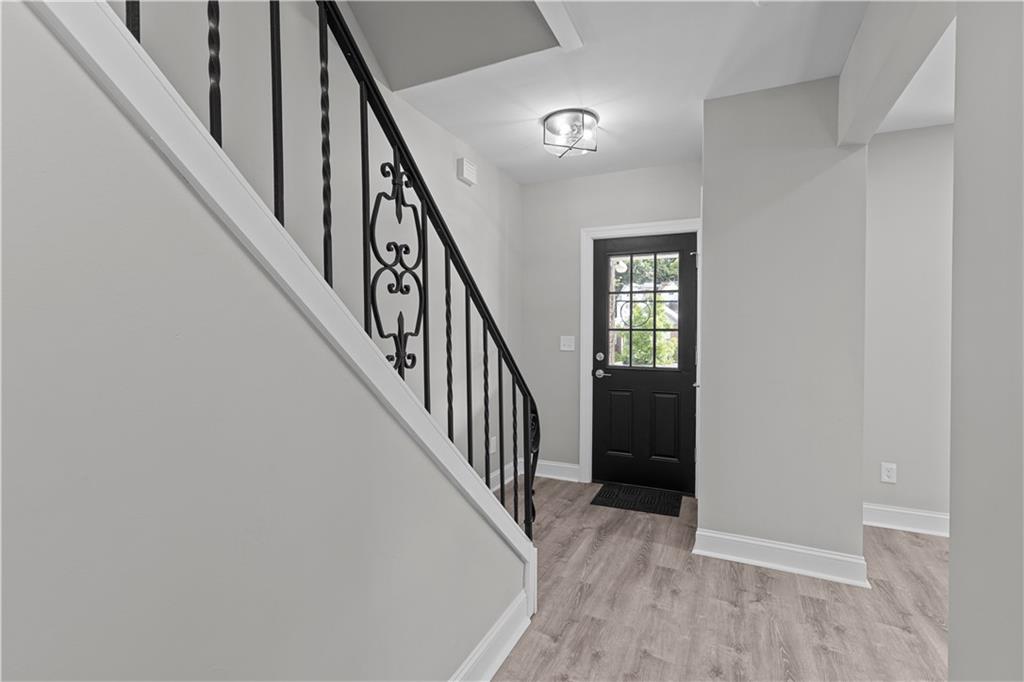 748 Anaheim Street Pittsburgh, PA 15219 - Photo 5 of 29 a view of an entryway with wooden floor