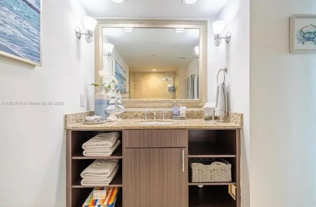 a couple of cars parked in front of house