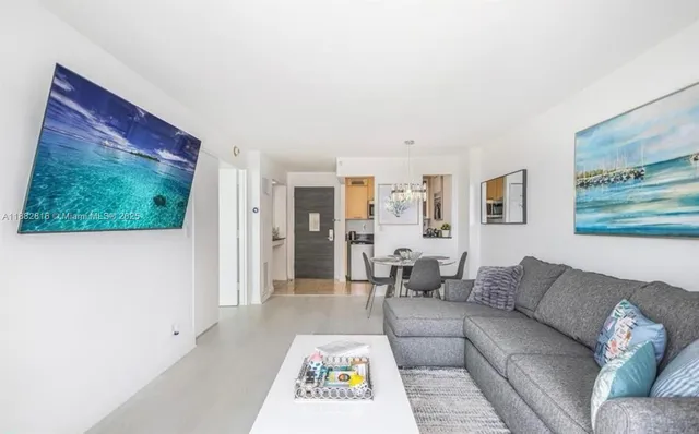 a living room with furniture and a gate