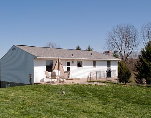 66 Henry Road Tarentum, PA 15084 - Photo 14 of 17 Stable/Barn. Enjoy the views of the property and the horses from the rear porch.