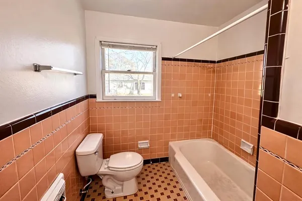 a view of a room with a window