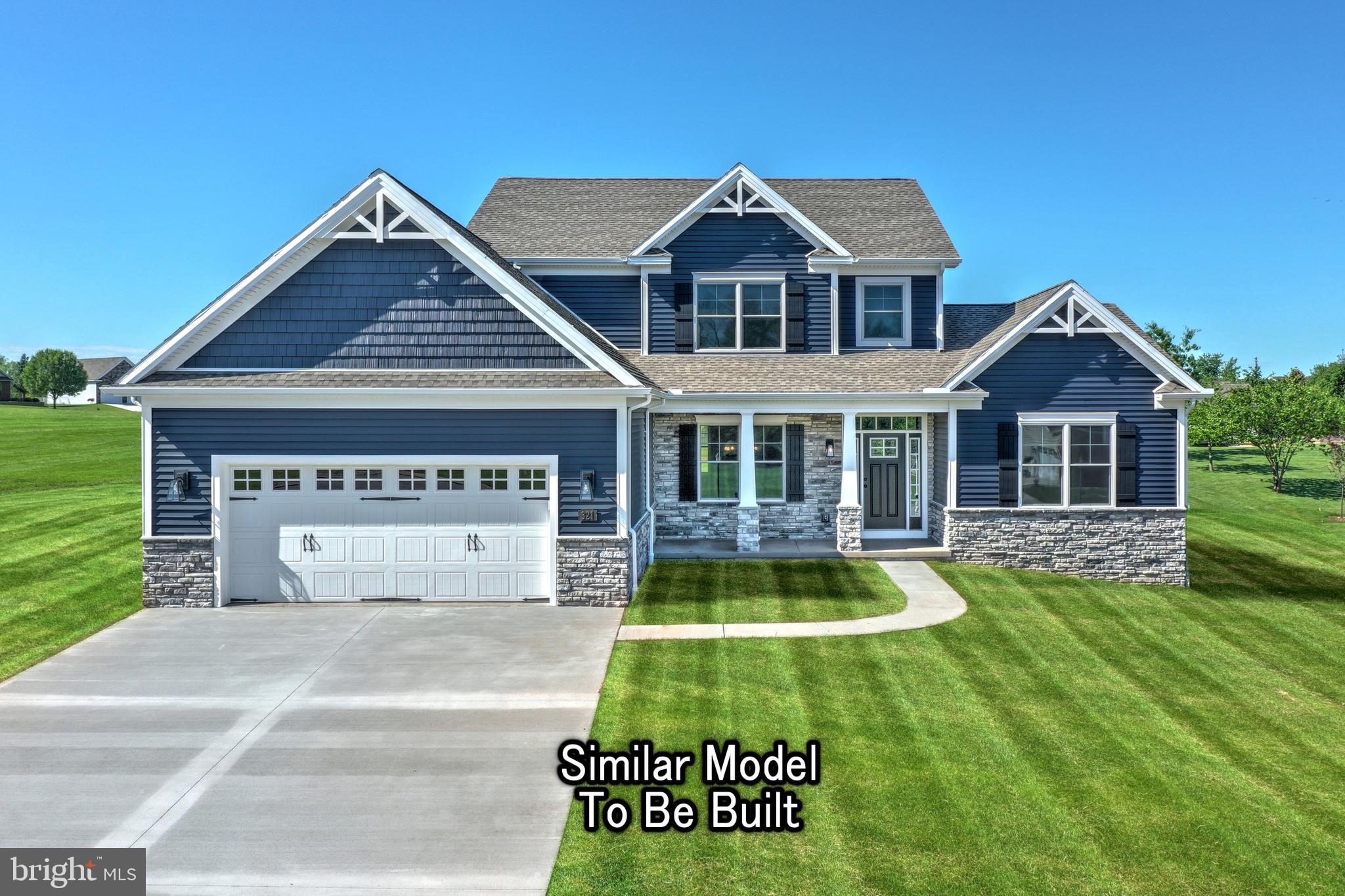 a front view of a house with yard