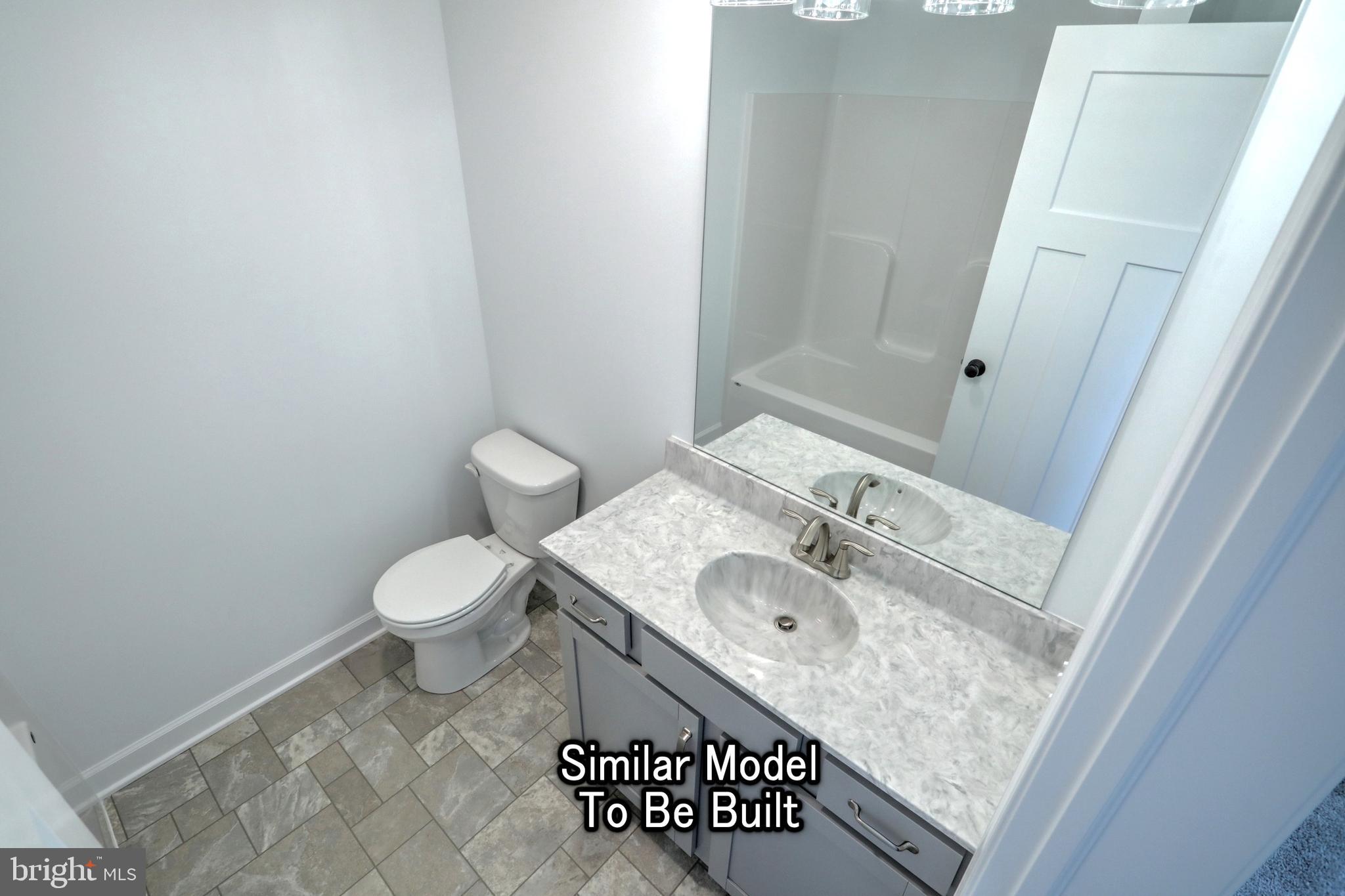 3227 Oxford Road New Oxford, PA 17350 - Photo 23 of 66 a bathroom with a sink and a toilet