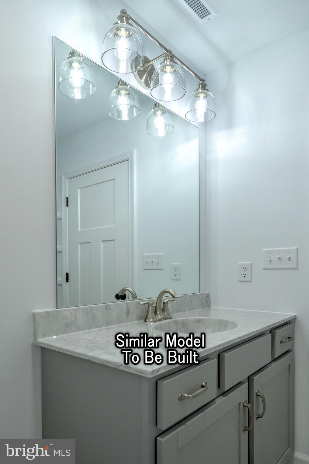 3227 Oxford Road New Oxford, PA 17350 - Photo 24 of 66 a bathroom with a sink and a mirror