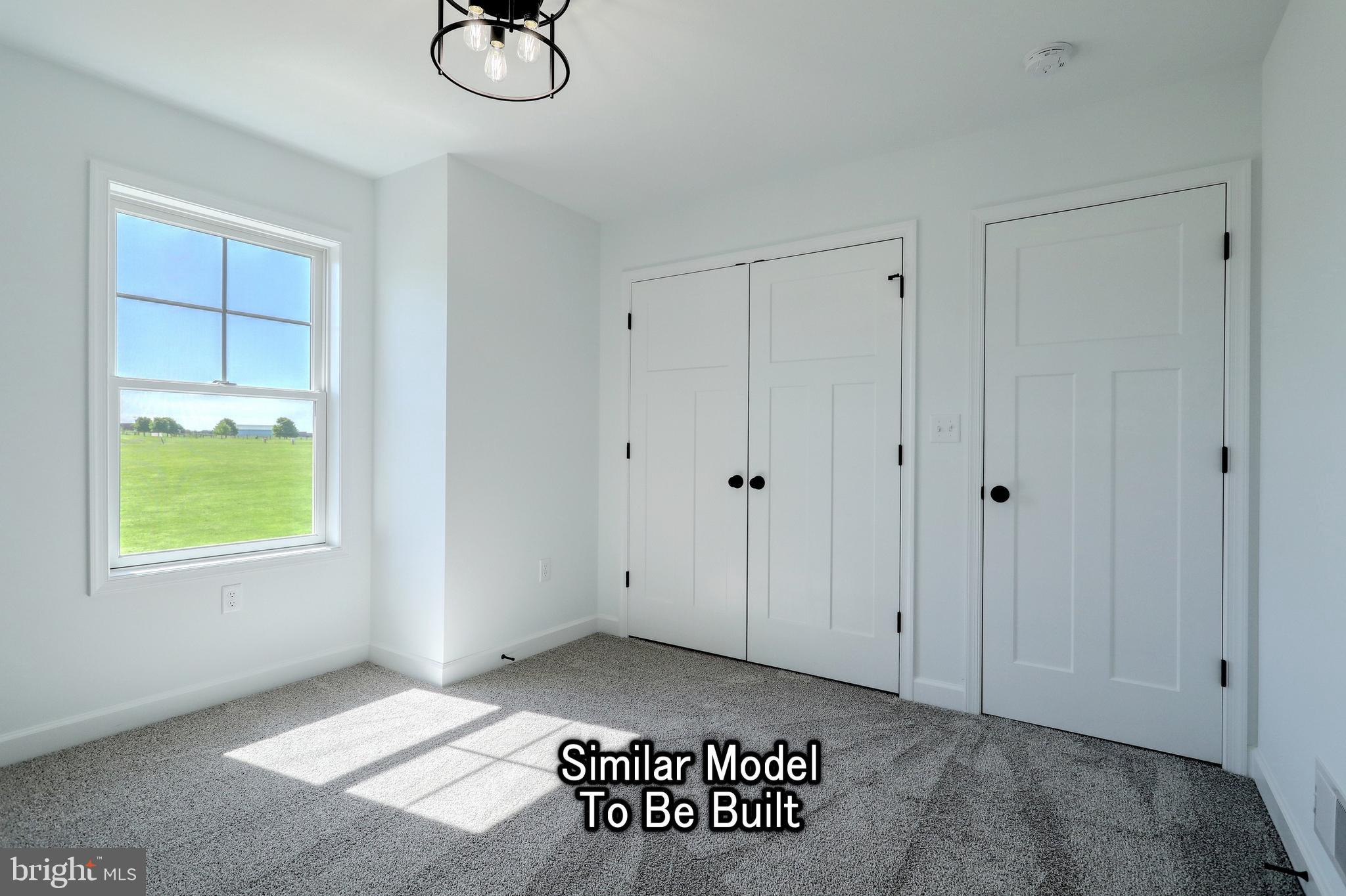 3227 Oxford Road New Oxford, PA 17350 - Photo 26 of 66 a view of an empty room with a window