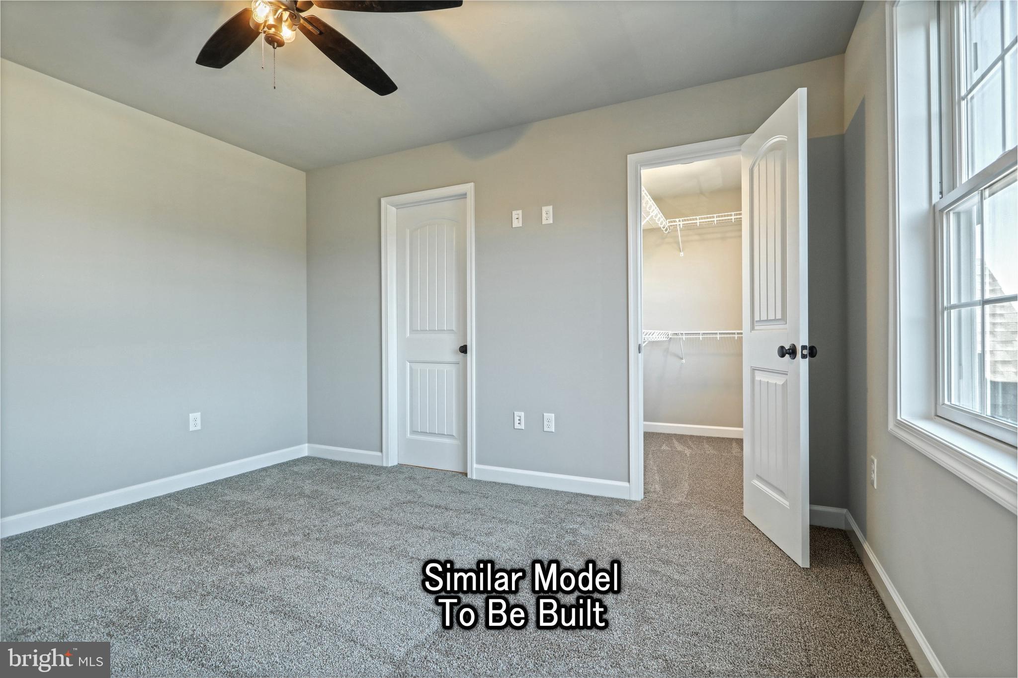 3227 Oxford Road New Oxford, PA 17350 - Photo 53 of 66 an empty room with windows and ceiling fan