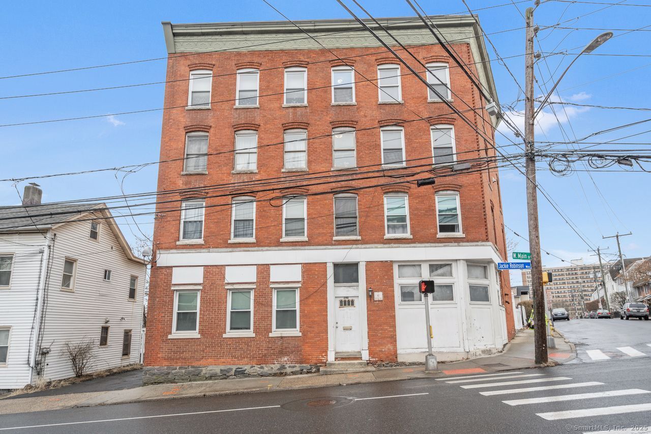 a view of a building and a street