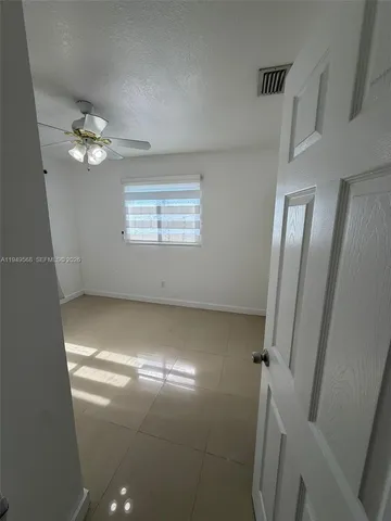 a view of empty room with window