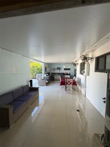 a house view with a outdoor space