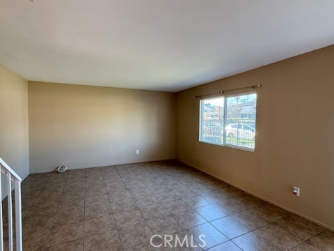 249 East Jackson Street, Unit C Rialto, CA 92376 - Photo 3 of 12 an empty room with windows