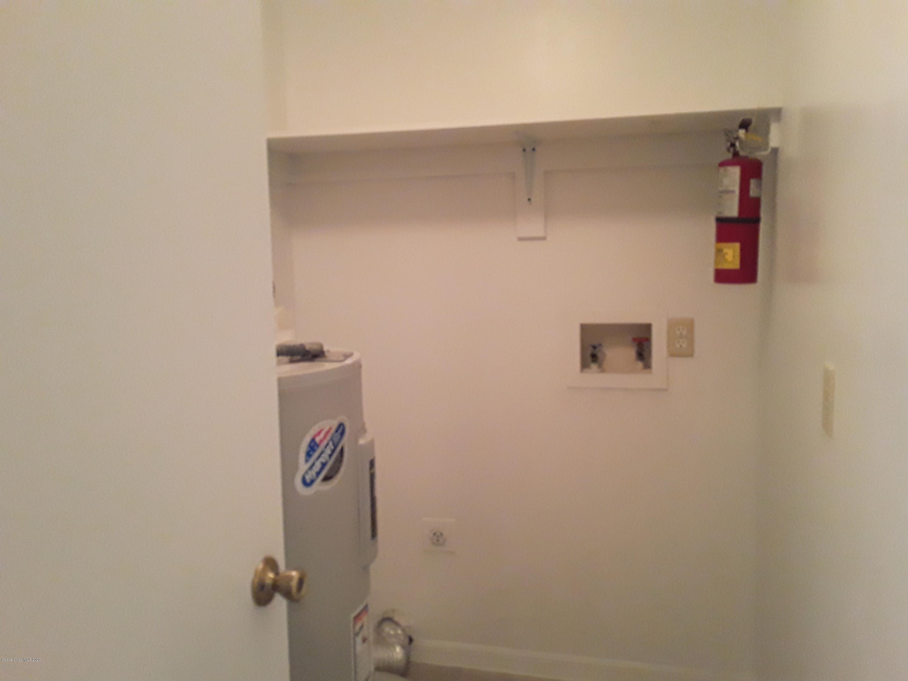 1049 June Drive Melbourne, FL 32935 - Photo 12 of 12 close up of a wall