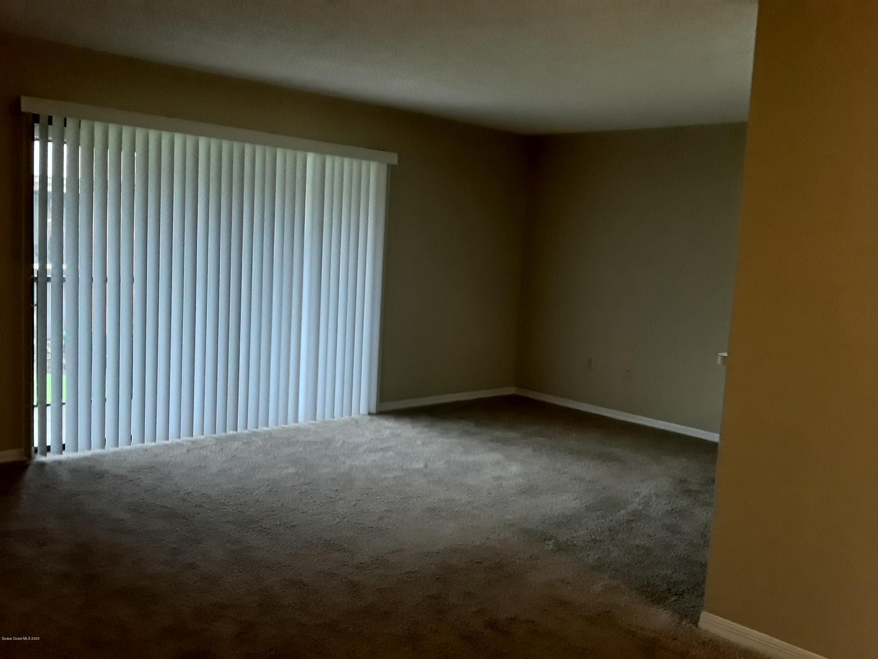 1049 June Drive Melbourne, FL 32935 - Photo 4 of 12 a view of empty room