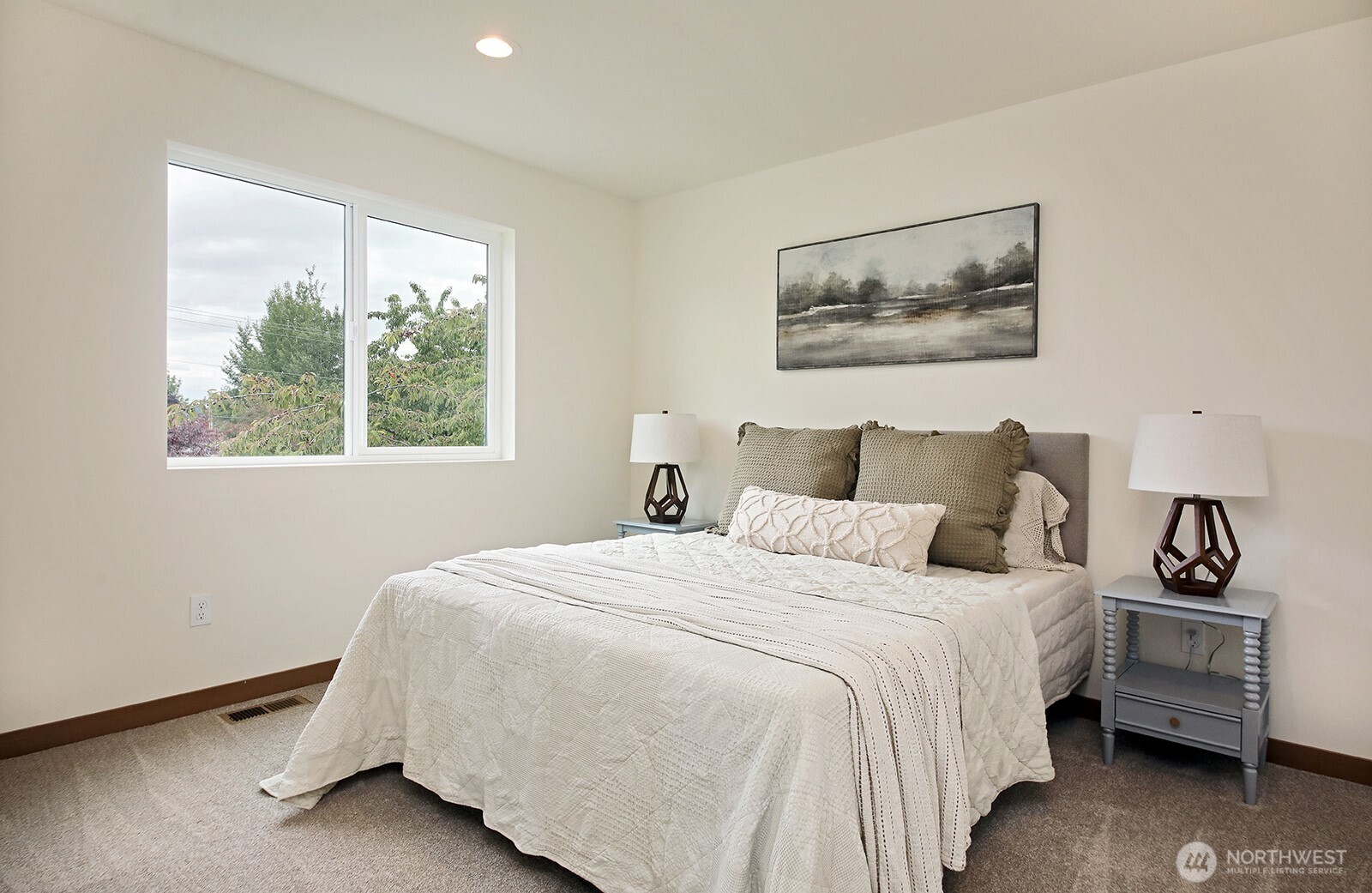 695 3rd Street, Unit B Langley, WA 98260 - Photo 21 of 28 a bedroom with a bed and a window