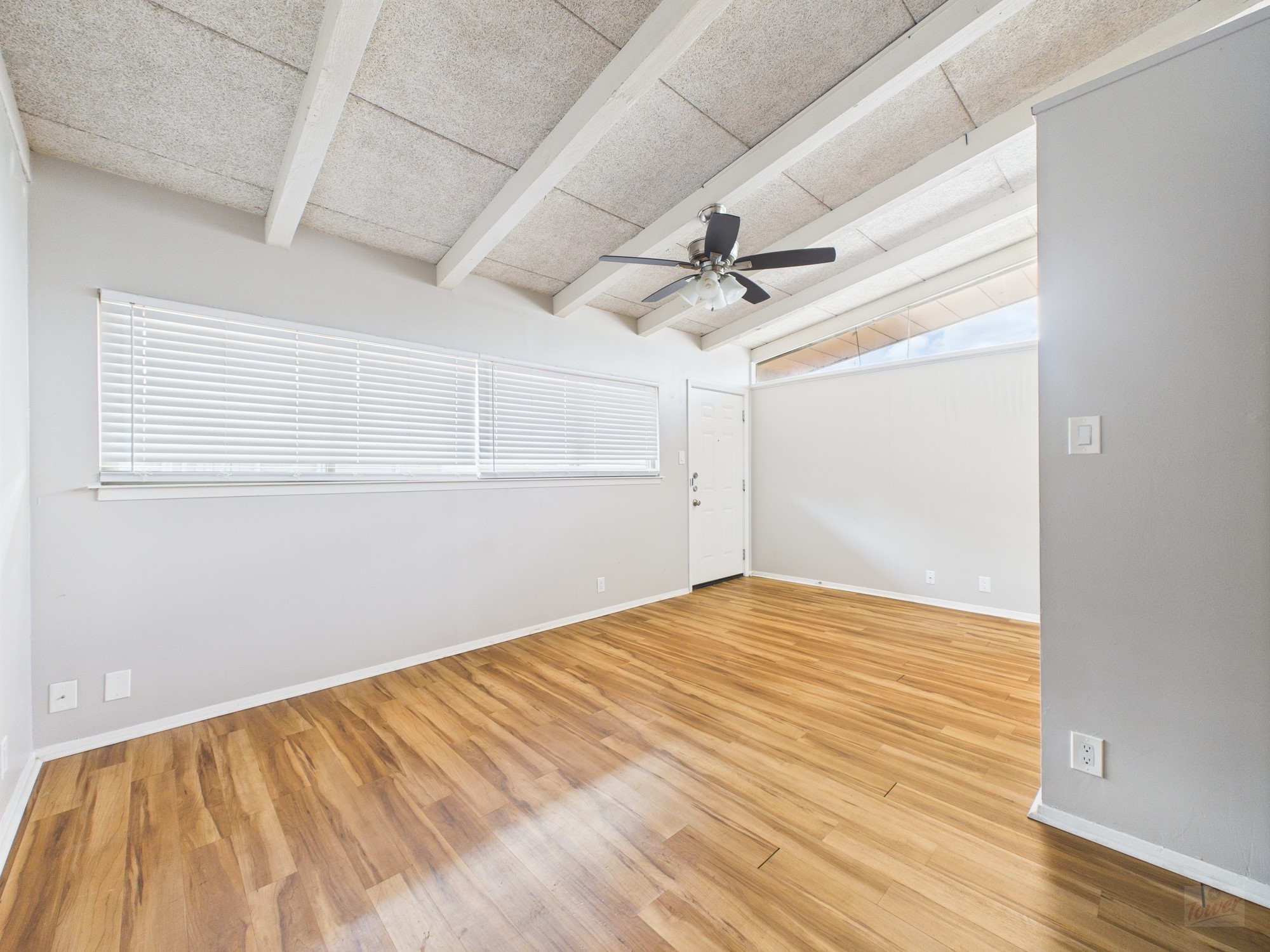 2404 Longview Street, Unit 206 Austin, TX 78705 - Photo 13 of 28 a view of empty room with wooden floor
