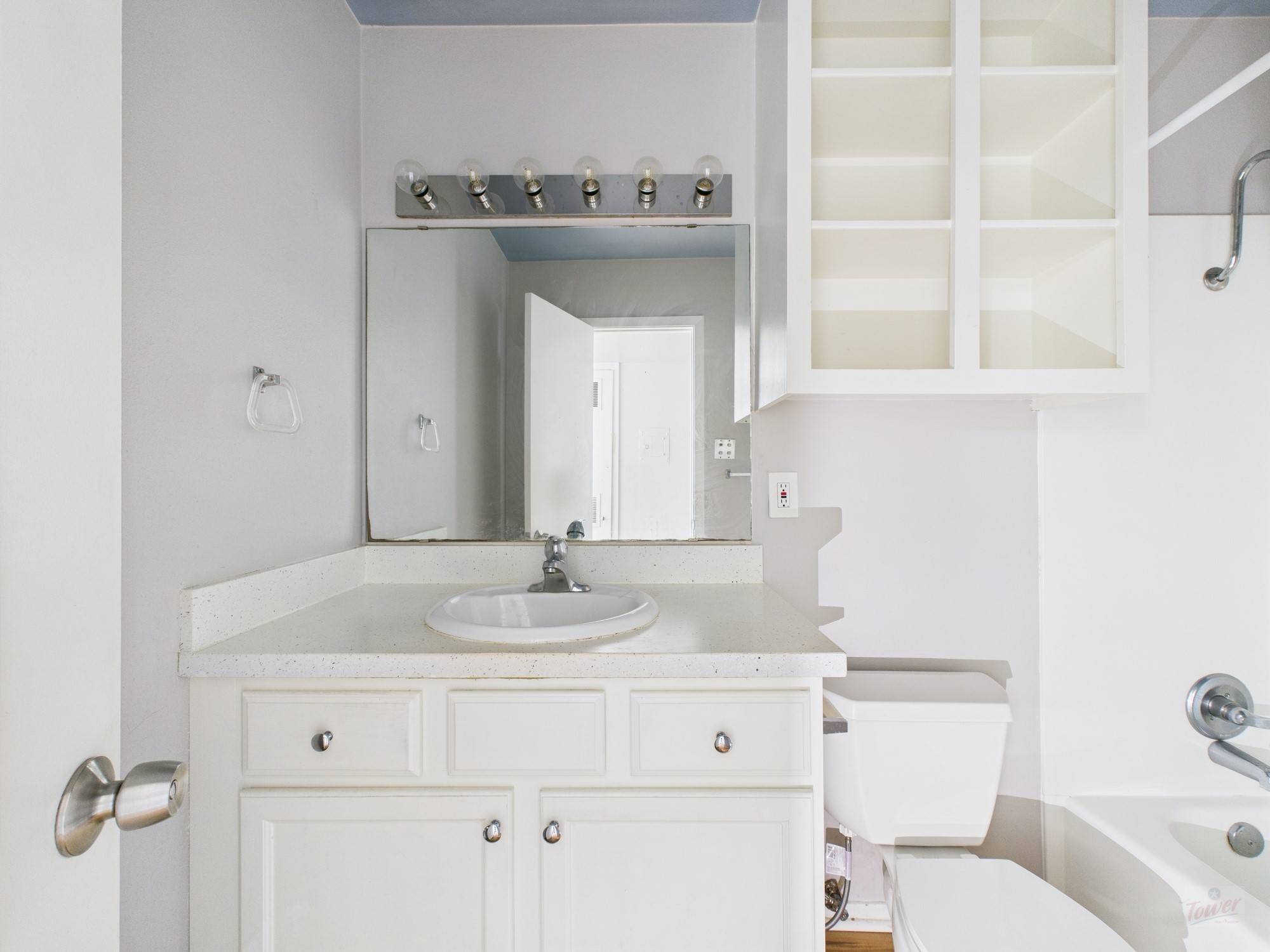 2404 Longview Street, Unit 206 Austin, TX 78705 - Photo 21 of 28 a bathroom with a sink and a mirror