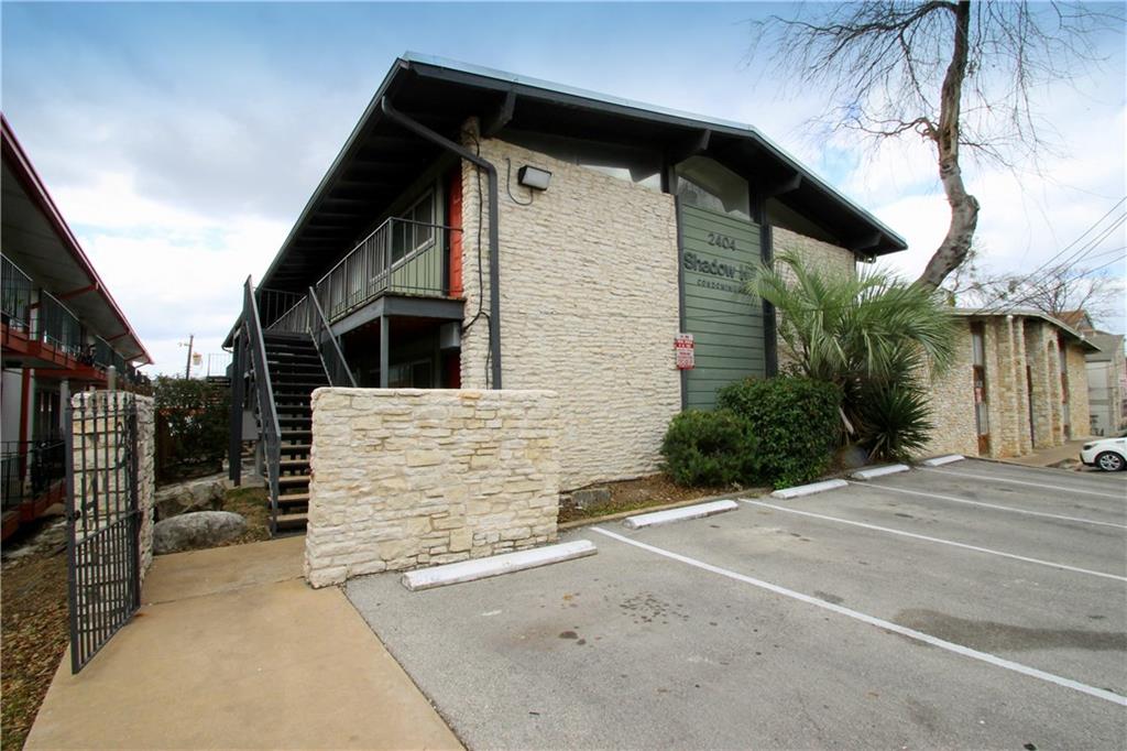 2404 Longview Street, Unit 206 Austin, TX 78705 - Photo 26 of 28 a view of a house with a street