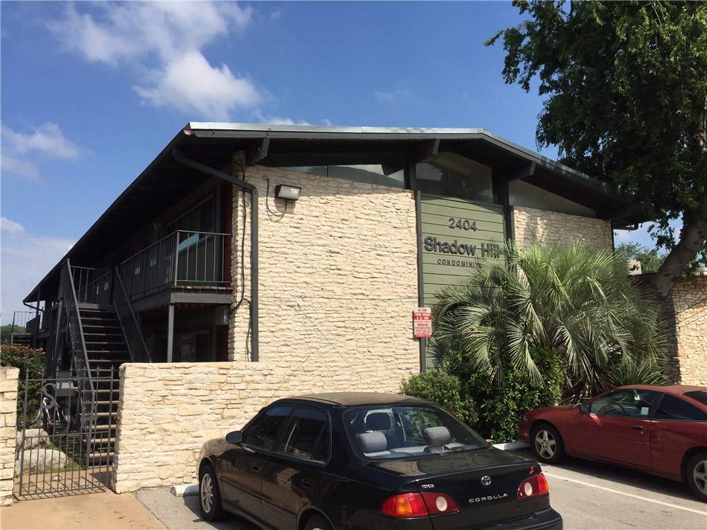 2404 Longview Street, Unit 206 Austin, TX 78705 - Photo 27 of 28 a view of a car parked front of a house