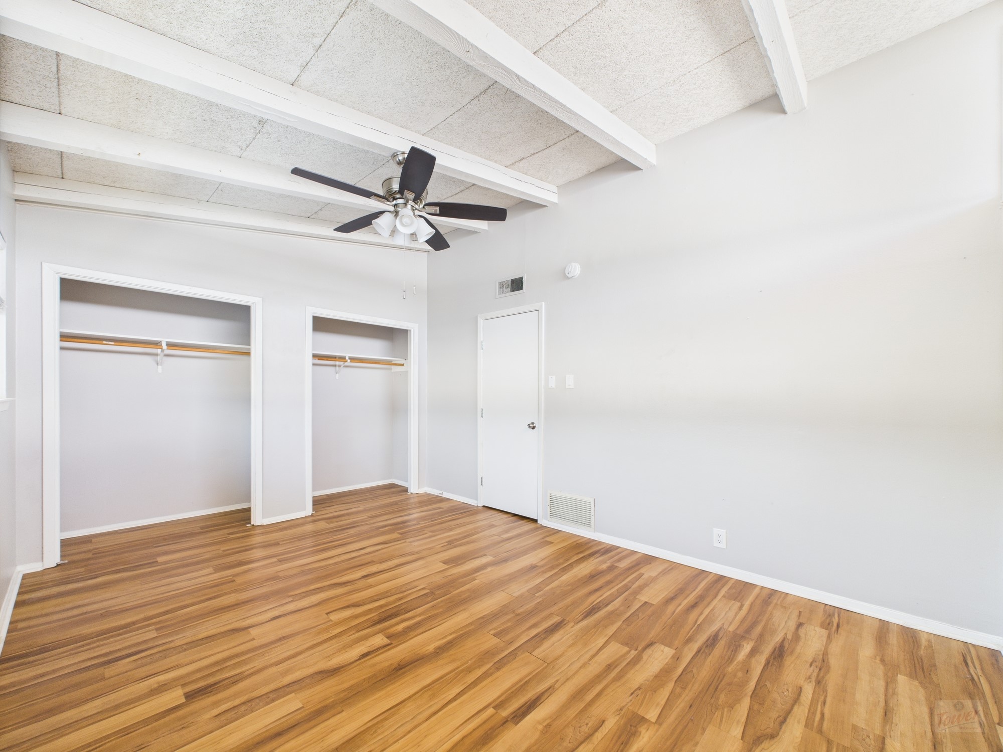 2404 Longview Street, Unit 206 Austin, TX 78705 - Photo 4 of 28 a view of empty room with wooden floor