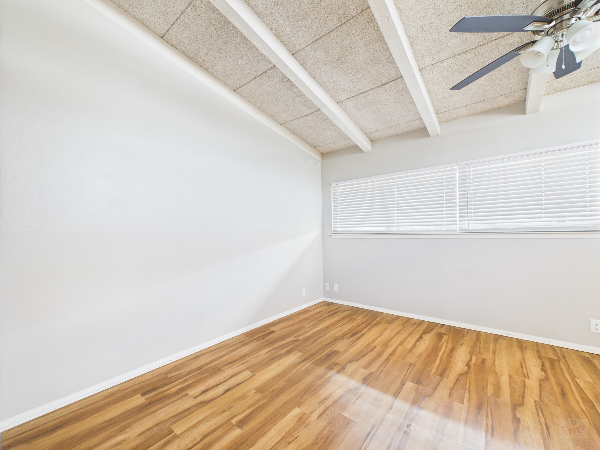 2404 Longview Street, Unit 206 Austin, TX 78705 - Photo 10 of 28 a view of empty room with wooden floor