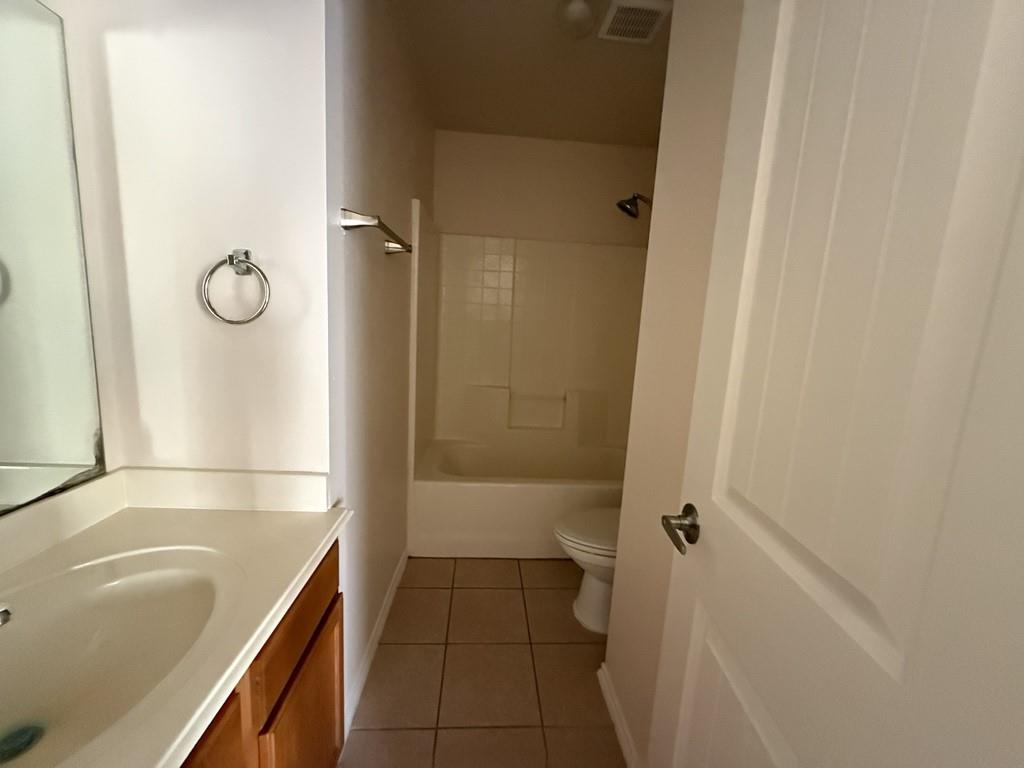 2224 Hummingbird Way Mesquite, TX 75181 - Photo 24 of 28 a bathroom with a tub a sink and a shower