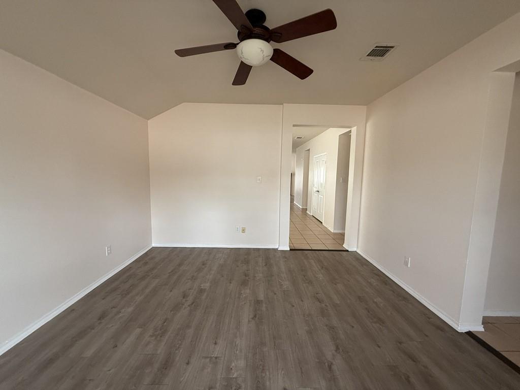 2224 Hummingbird Way Mesquite, TX 75181 - Photo 8 of 28 wooden floor in an empty room