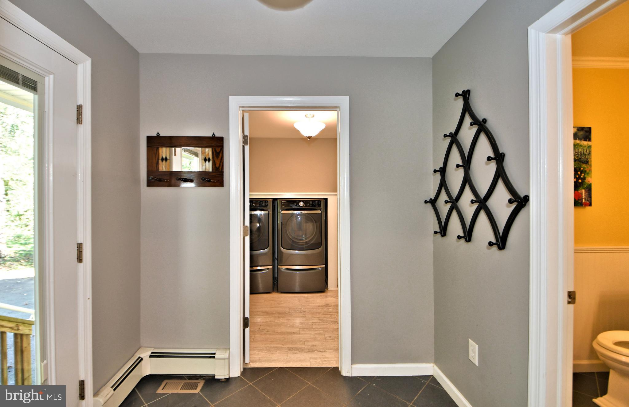 1441 Lawrenceville Road Lawrenceville, NJ 08648 - Photo 22 of 49 Mud room to half bath, laundry & Deck to rear yard