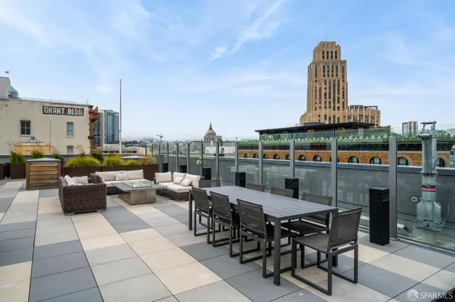 a view of dinning table and chairs in the terrace