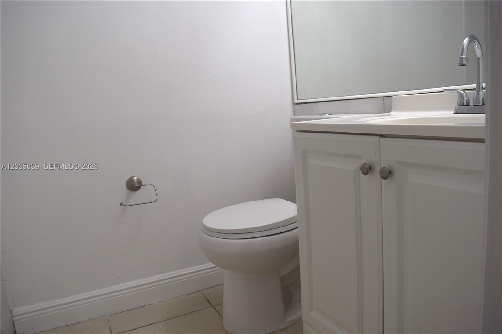 5628 Rock Island Road, Unit 185 Tamarac, FL 33319 - Photo 17 of 29 a bathroom with a sink a toilet and shower