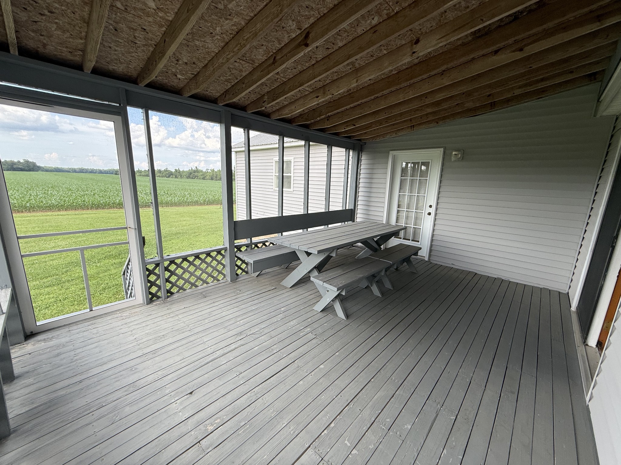 2971 Monroe Floyd Road Decherd, TN 37324 - Photo 24 of 26 a view of a deck with wooden floor and outdoor space