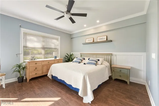 a bed room with a bed and a window