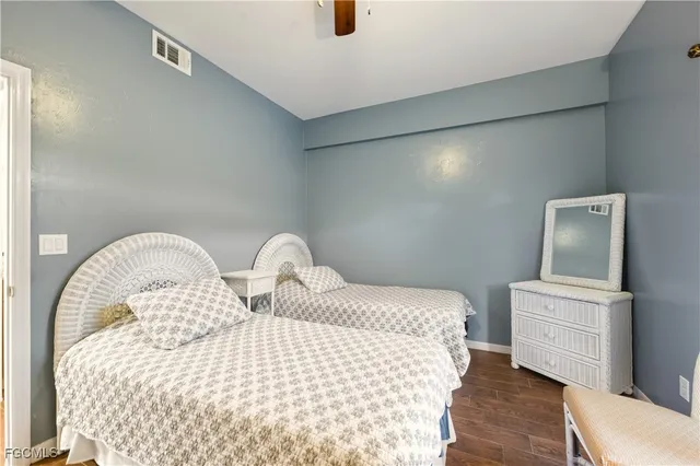 a bedroom with bed and window