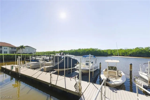 a view of a balcony with two chairs and a table
