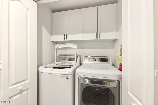 a kitchen with a stove and a microwave