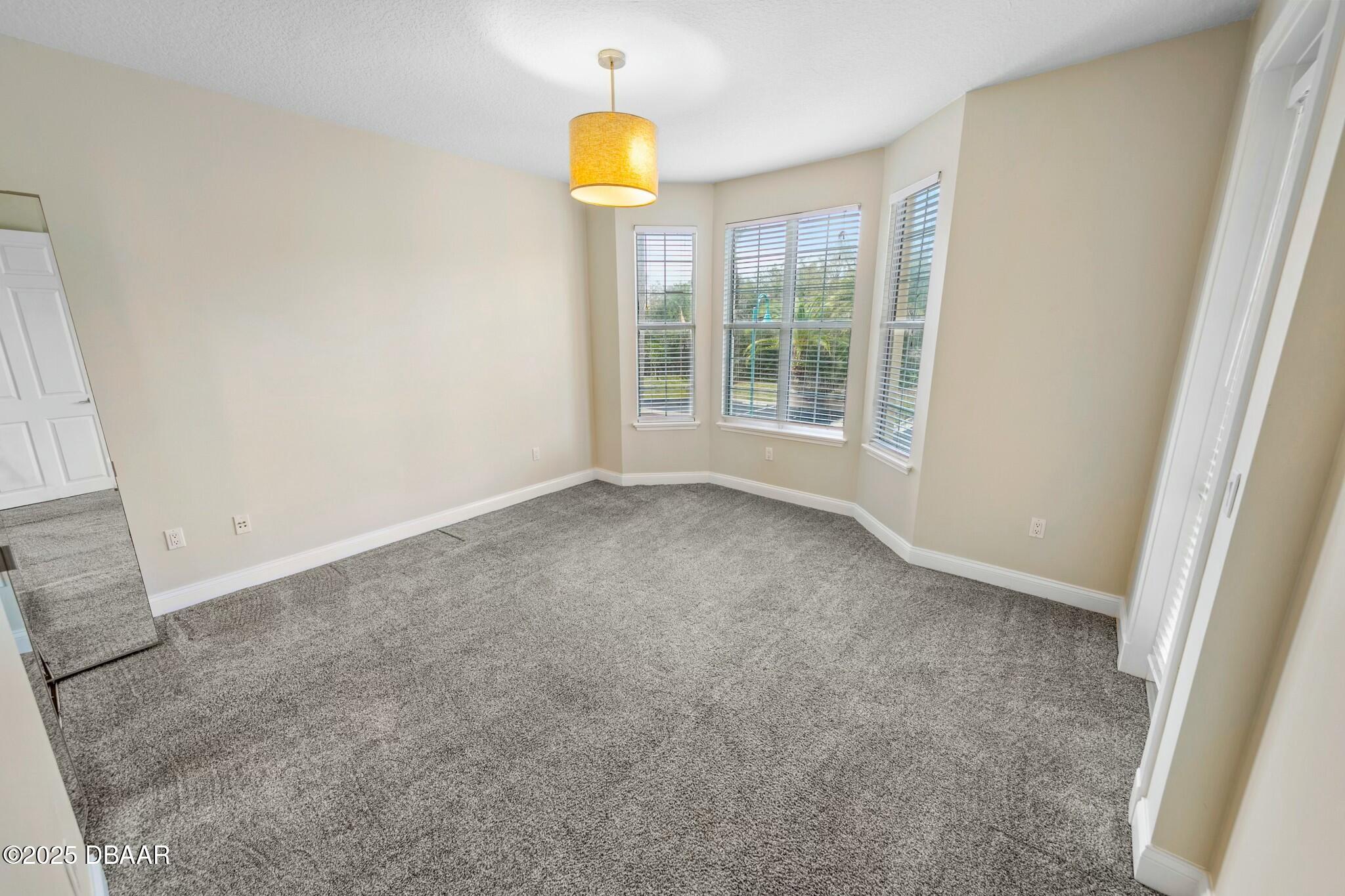 4623 Rivers Edge Village Lane, Unit 6204 Ponce Inlet, FL 32127 - Photo 22 of 51 a view of room and window