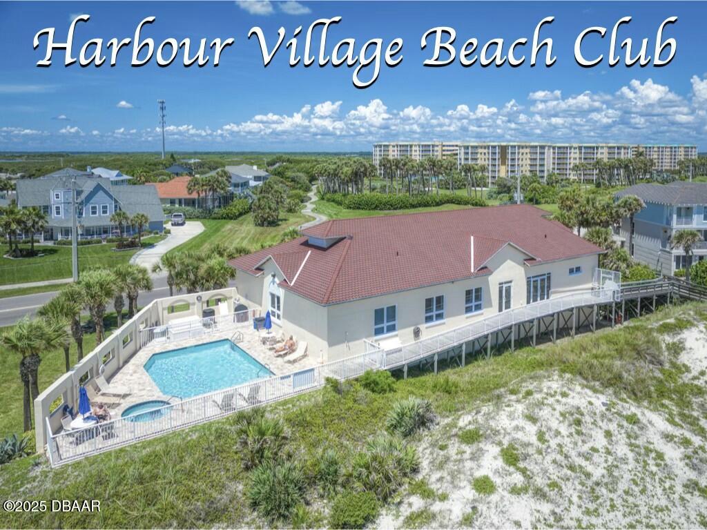 4623 Rivers Edge Village Lane, Unit 6204 Ponce Inlet, FL 32127 - Photo 30 of 51 a view of a house with a yard