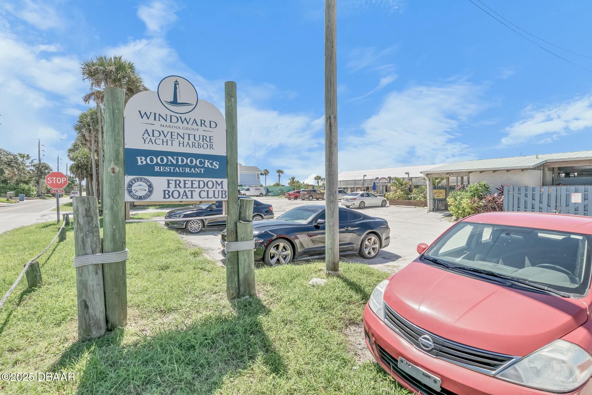 4623 Rivers Edge Village Lane, Unit 6204 Ponce Inlet, FL 32127 - Photo 50 of 51 a sign board with a play ground
