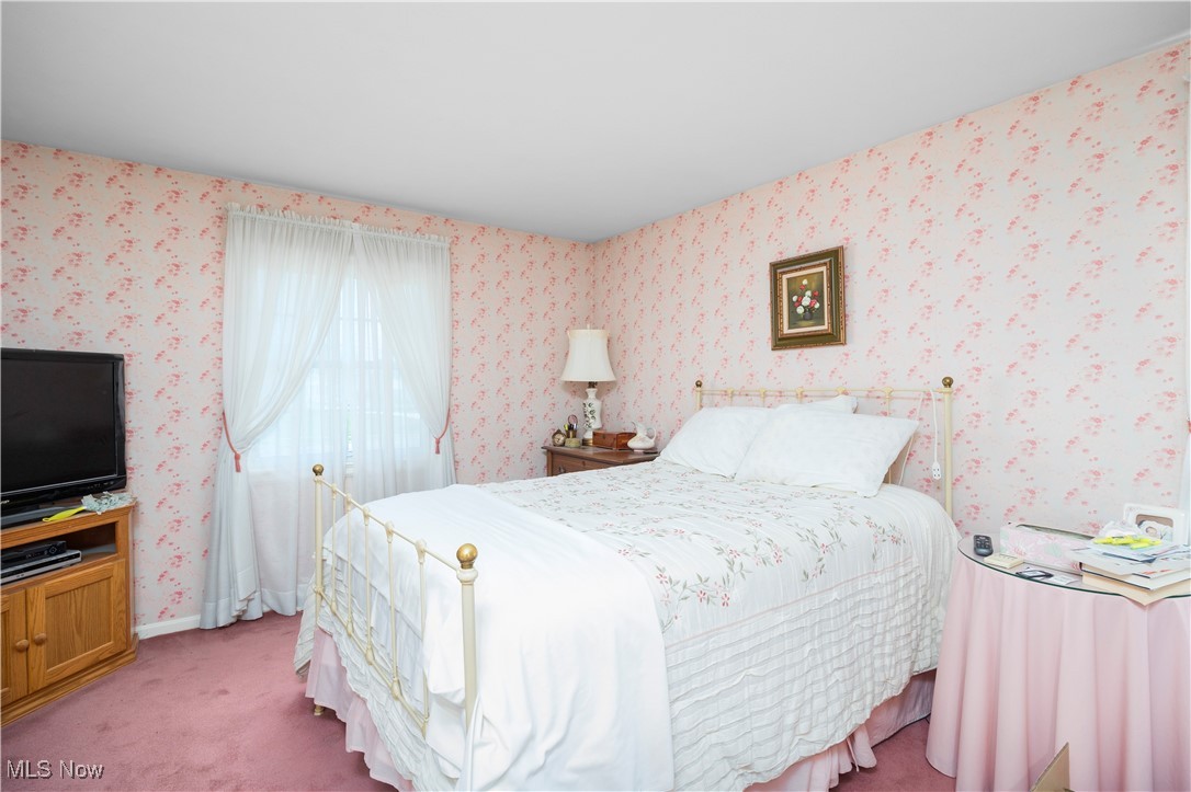 26907 Lake Road Bay Village, OH 44140 - Photo 13 of 33 This bedroom is located on the second floor of the home, it features a lovely window and nice size closet.