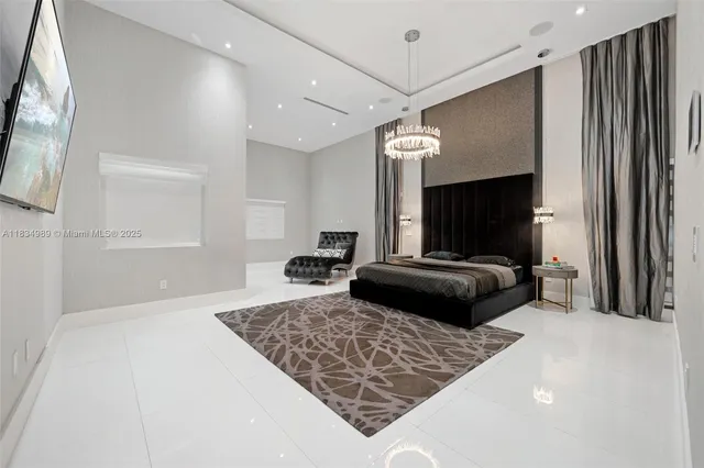 a bathroom with a large tub sink and mirror