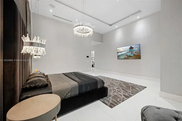 a white toilet sitting next to a white sink