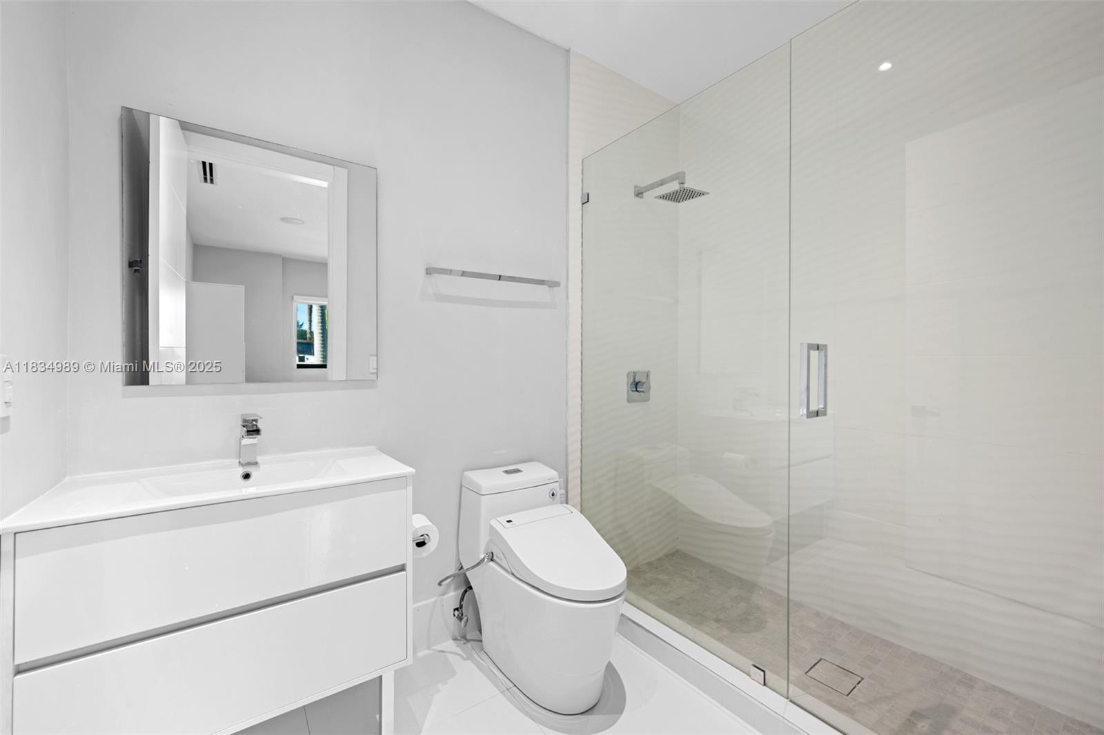 11350 Northwest 8th Street Plantation, FL 33325 - Photo 30 of 68 a bathroom with a toilet sink and shower