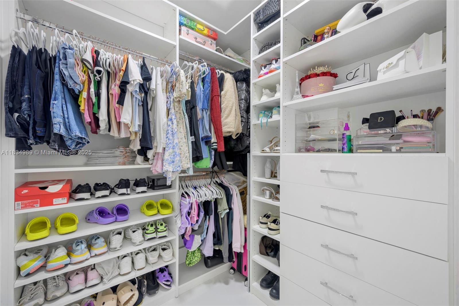 11350 Northwest 8th Street Plantation, FL 33325 - Photo 39 of 68 a view of walk in closet with clothes