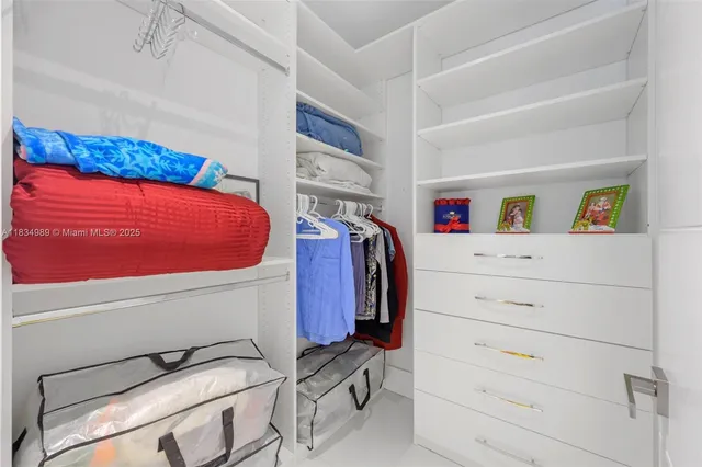 a view of a swimming pool with a yard