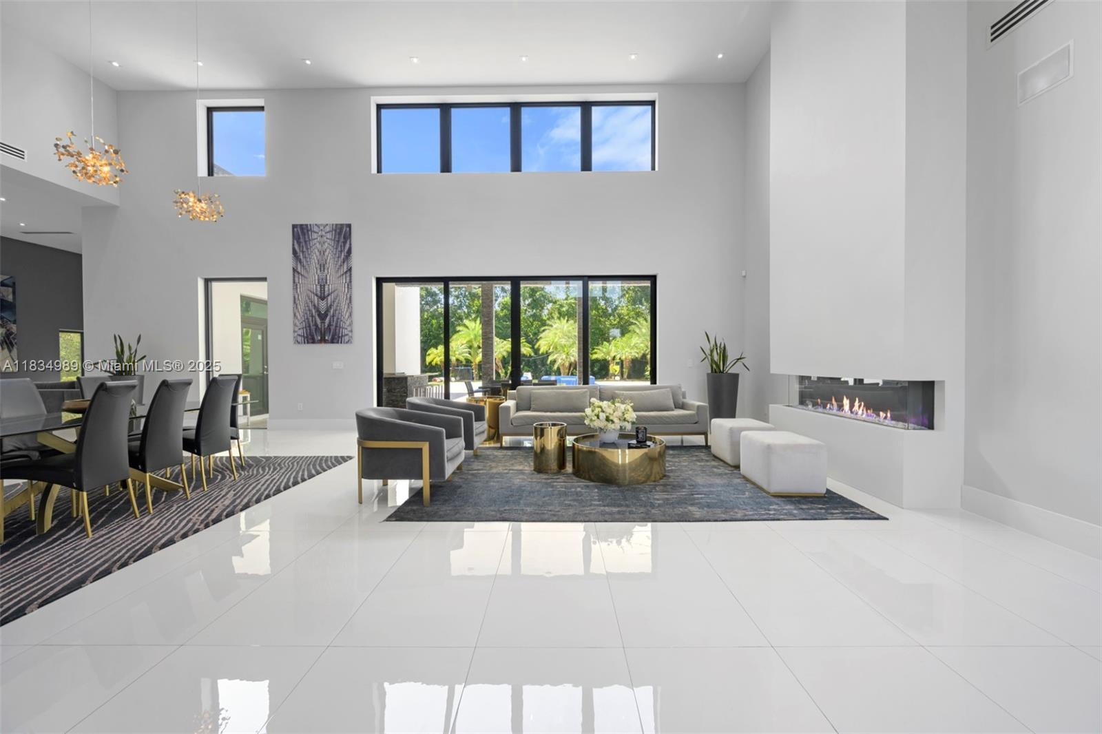 11350 Northwest 8th Street Plantation, FL 33325 - Photo 5 of 68 a living room with furniture and a large window