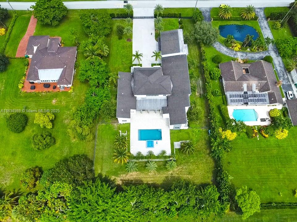 11350 Northwest 8th Street Plantation, FL 33325 - Photo 62 of 68 an aerial view of a house with pool yard and outdoor seating