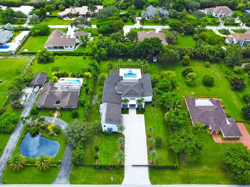11350 Northwest 8th Street Plantation, FL 33325 - Photo 63 of 68 an aerial view of residential houses with outdoor space and street view